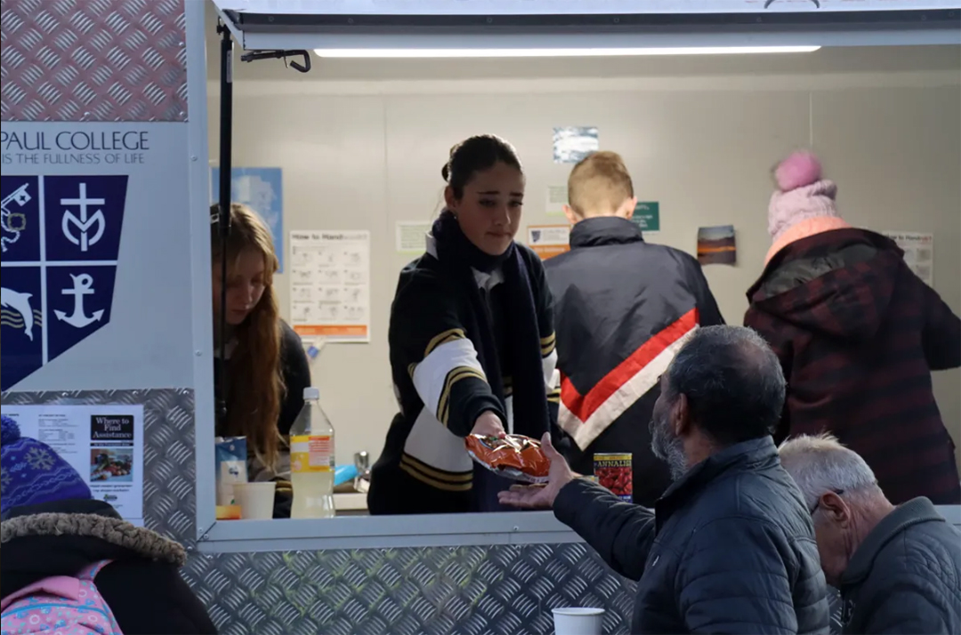 Student volunteers at the food and outreach van