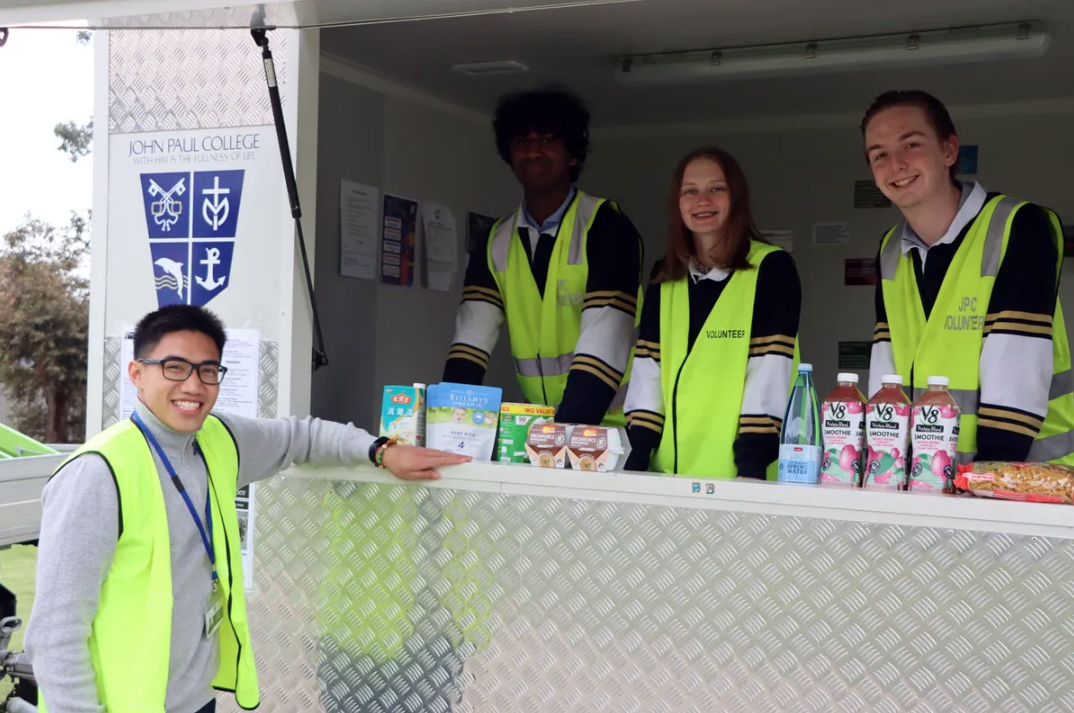 Student volunteers at the food and outreach van