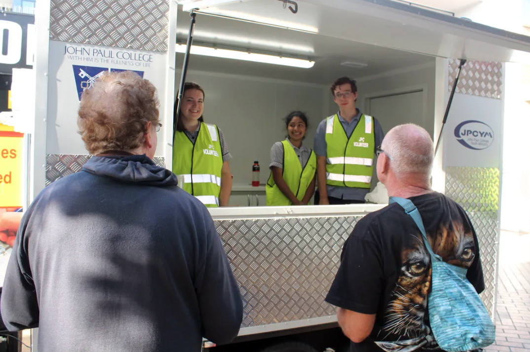 Student volunteers at the food and outreach van